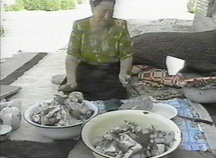 A Turkmen lady preparing a meal