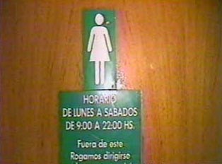 Women's restroom with hours