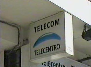 Close-up of telecenter sign