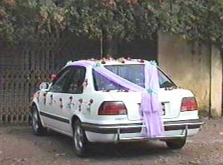 A decorated groom's car