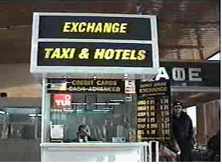 Booth for money exchange, taxi and hotel reservations