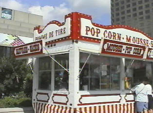 Popcorn stand advertising its offerings