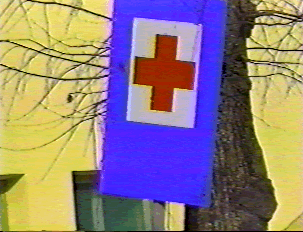 Red cross sign indicating a clinic 