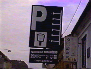 Parking sign showing times when parking is permitted  