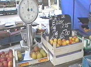 Weigh scale, fruit and vegetables on display