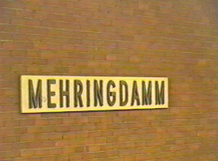A sign for the name of the station