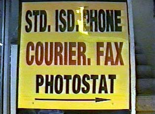 Sign for phone booth, photocopy machine, and fax machine