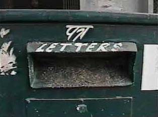 Slot for letters on mailbox
