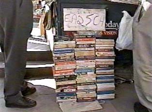 Close-up of books at magazine and book stand
