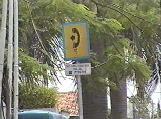 Sign for public phone