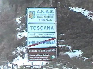 Sign indicating the end of the Emilia-Romagna region and the beginning of the Tuscany region