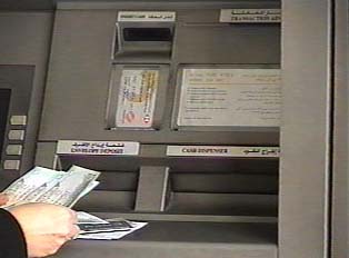 At an ATM machine