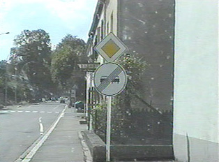 Signs indicating end of passing zone