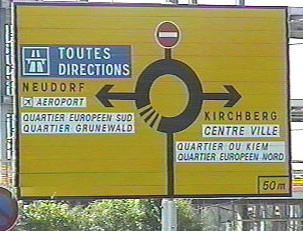 Sign indicating directions on a rotary