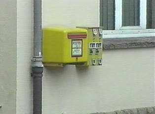 Mailbox and old fashioned stamp machine