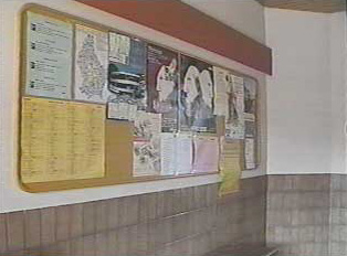 Information board in train station lounge