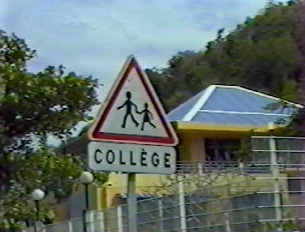 Slow down, school nearby and children crossing