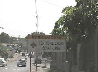 Caution sign nearing health center