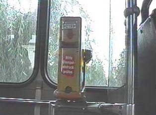Front view of ticket validating machine on bus