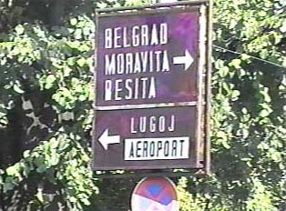 Directional sign to other cities and the airport