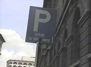 Sign for a paid parking lot with a time limit