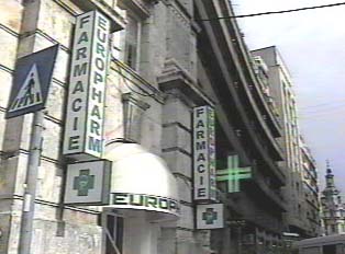 Front of pharmacy with sign