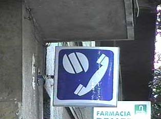 Sign for a public phone