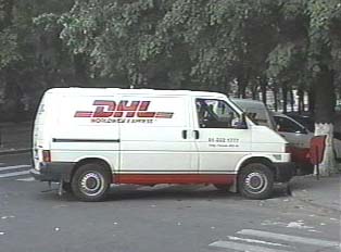 A DHL overnight delivery service van