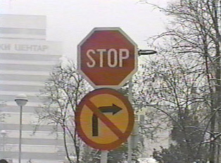 Stop sign and no right turn
