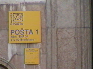 A  post office with the Slovakian post symbol and signs