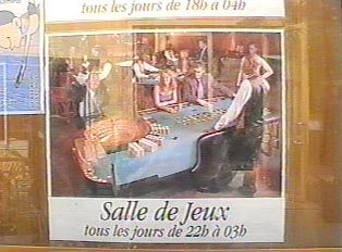Posters listing the hours of operations of the Game Room