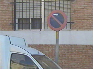 No parking right of this sign