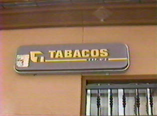 An 'estanco,' or a store that sells cigarettes and stamps ( 'Tabacos' is the tobacco sale authorization logo)