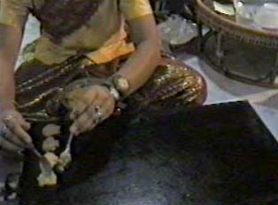 Woman preparing coconut dessert