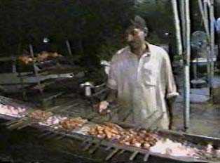 Roadside restaurant cooking skewer kebabs called 'seekh kebab'
