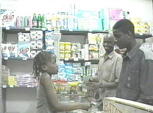 A child purchasing something at a convenience store