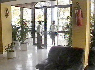 A person entering a hotel