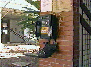 A black public pay phone