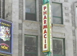 A vertical sign for a pharmacy