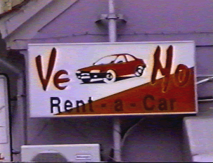 A car rental sign