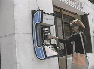 A person using a pay phone