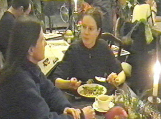 Two people eating a meal together