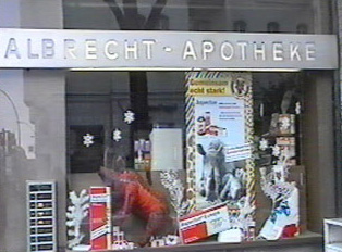 A pharmacy store front window called Albrecht - Apotheke