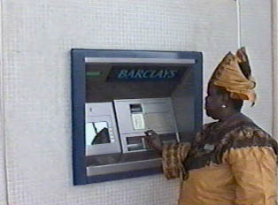 A person at an ATM