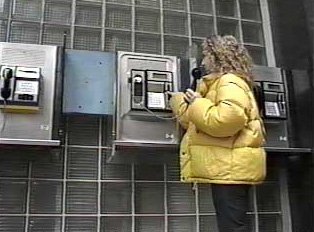 A person using a pay phone
