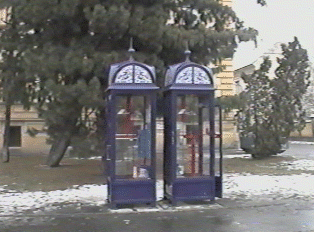 Two pay phone booths next to each other outside