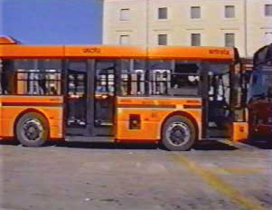 A bright orange bus