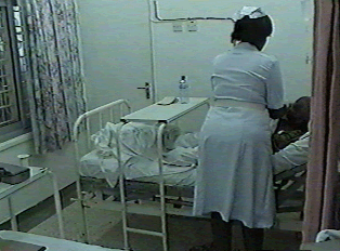 A nurse attending to a patient