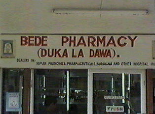 A sign that reads "Bede Pharmacy"