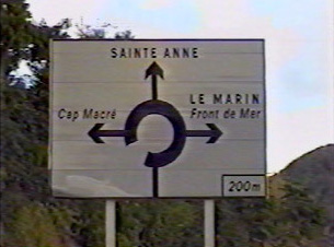 A road sign showing directions